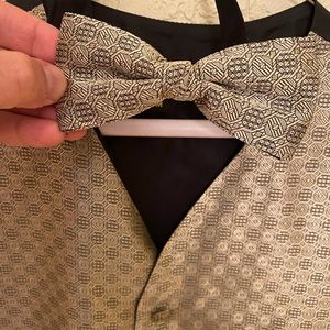 Gold toned bow tie and vest tuxedo set